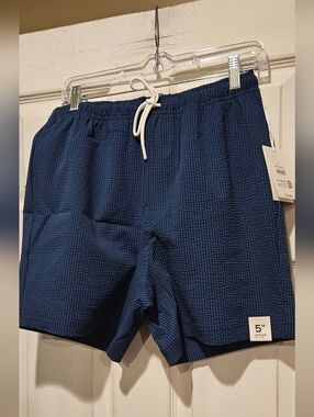 FREE ASSEMBLY SWIM TRUNKS
